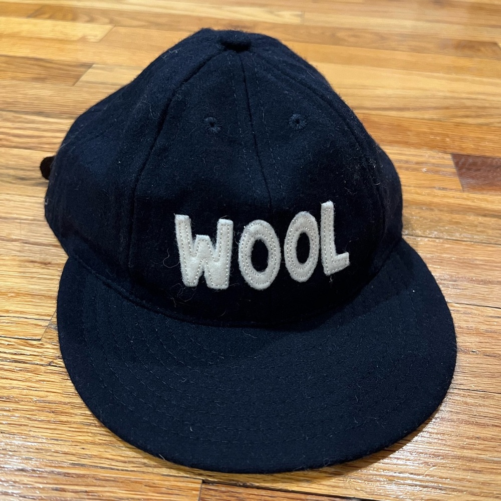 Degen navy vintage wool cap with adjustable leather back strap